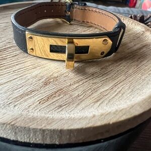 Hermes UNISEX Kelly Black leather and Gold Bracelet EUC